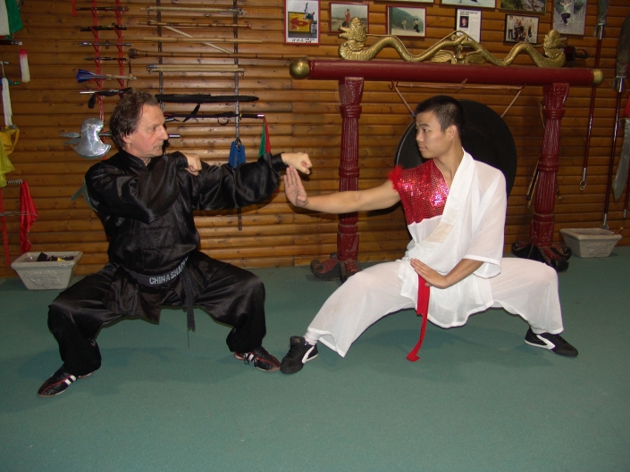 GM Walter Toch with shaolin monk and workshop sanda fighting in his Academy.